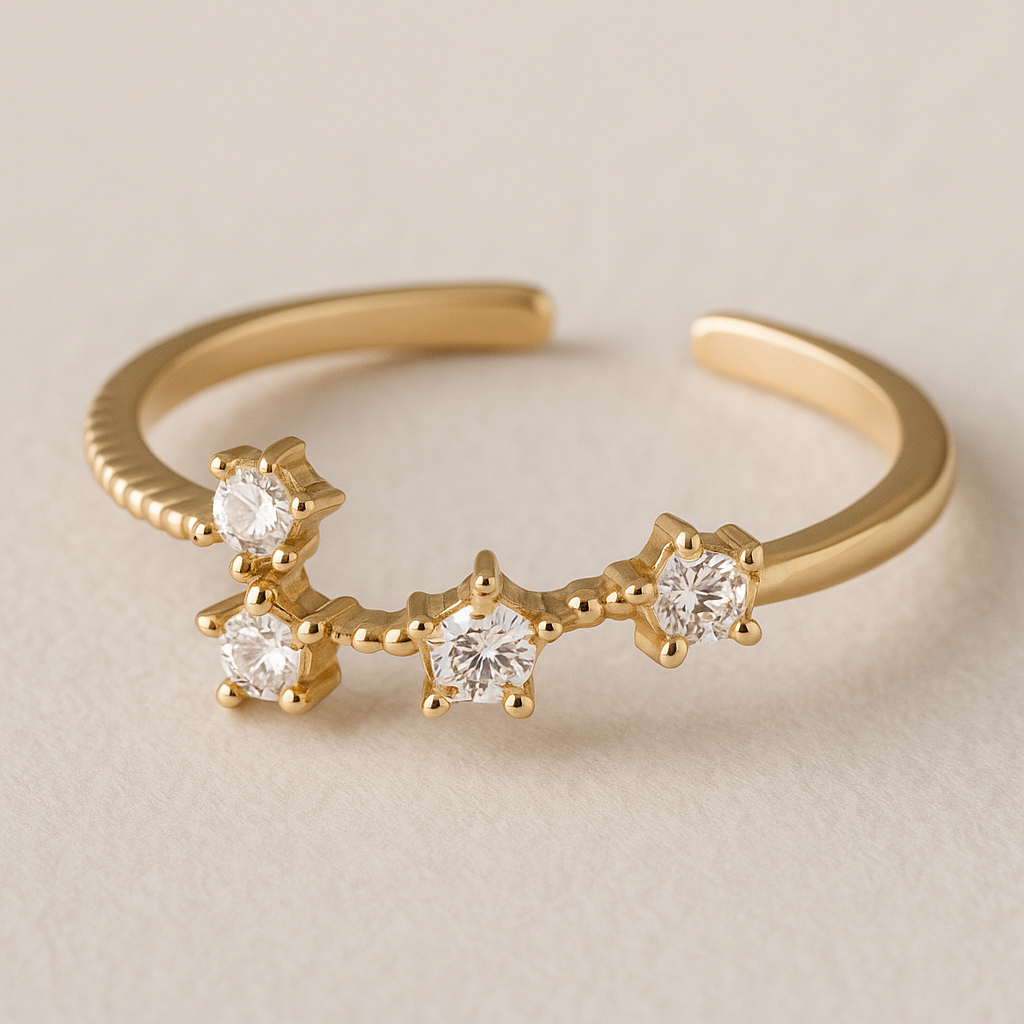 9ct gold 4 star celestial ring with cubic zirconia stones in the middle of each star